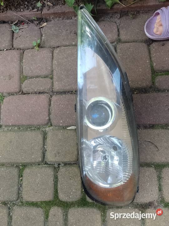 lampa lewa Nissan Primera P 11 lift 9902 uchwyty Bielsk Podlaski