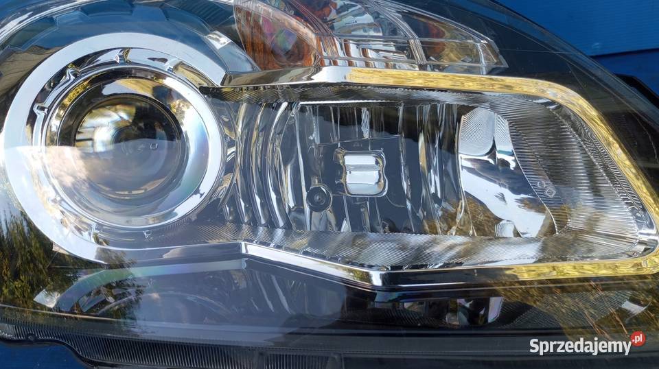 LAMPA PRAWY PRZÓD EU XENON RENAULT KOLEOS I 2008 osobowe Nowy Tomyśl