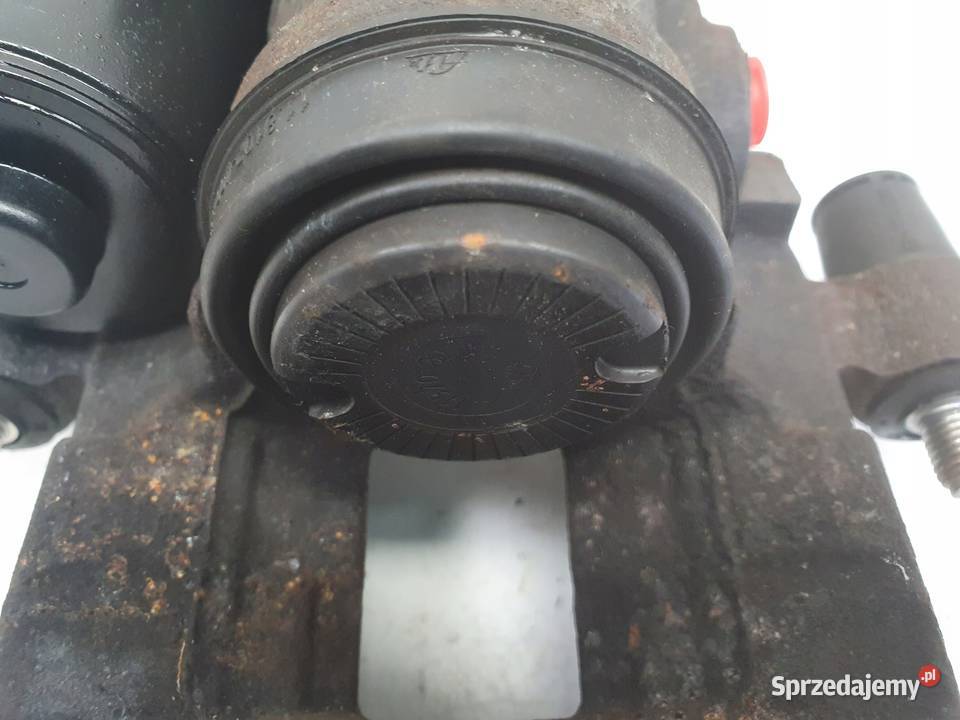 Volvo XC60 II TYLNY ZACISK HAMULCOWY LEWY tył Chełm