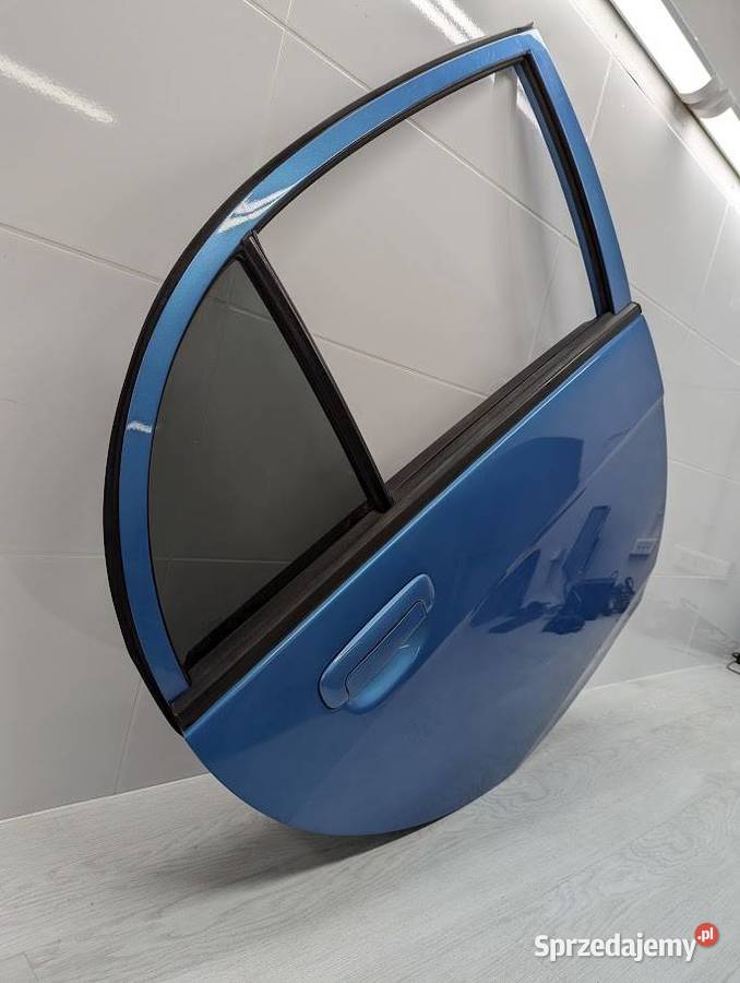 DRZWI PRAWY TYŁ TYLNE D22 AQUAMARINE MITSUBISHI