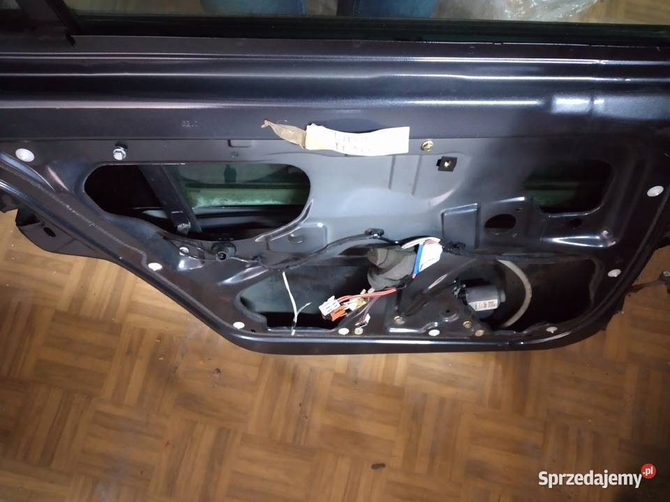DRZWI LEWY TYŁ RENAULT LAGUNA II LIFT KOMBI części blacharskie