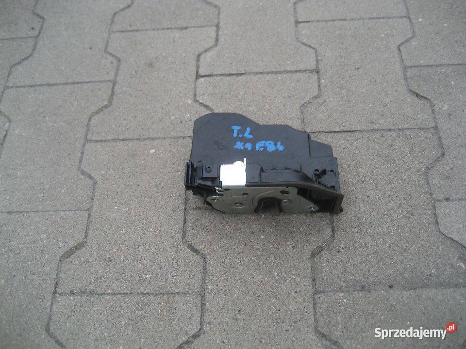 bmw x1 e84 0912r zamek drzwi tył lewy 7229459 Rakoniewice