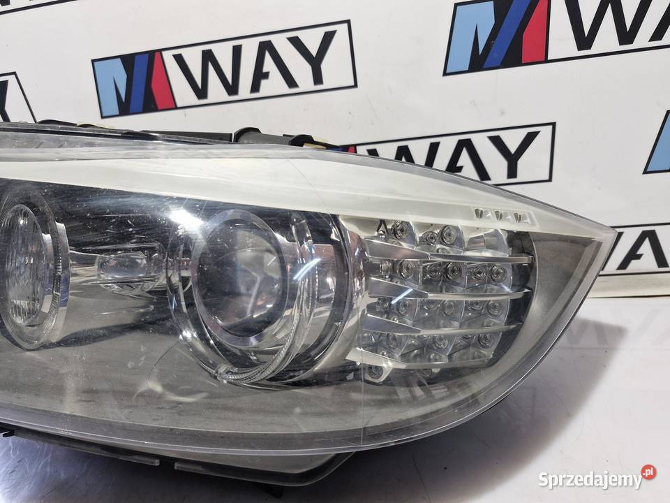 7202589 BMW E90 E91 LAMPA LEWA LEWY PRZÓD BI Lampy przednie