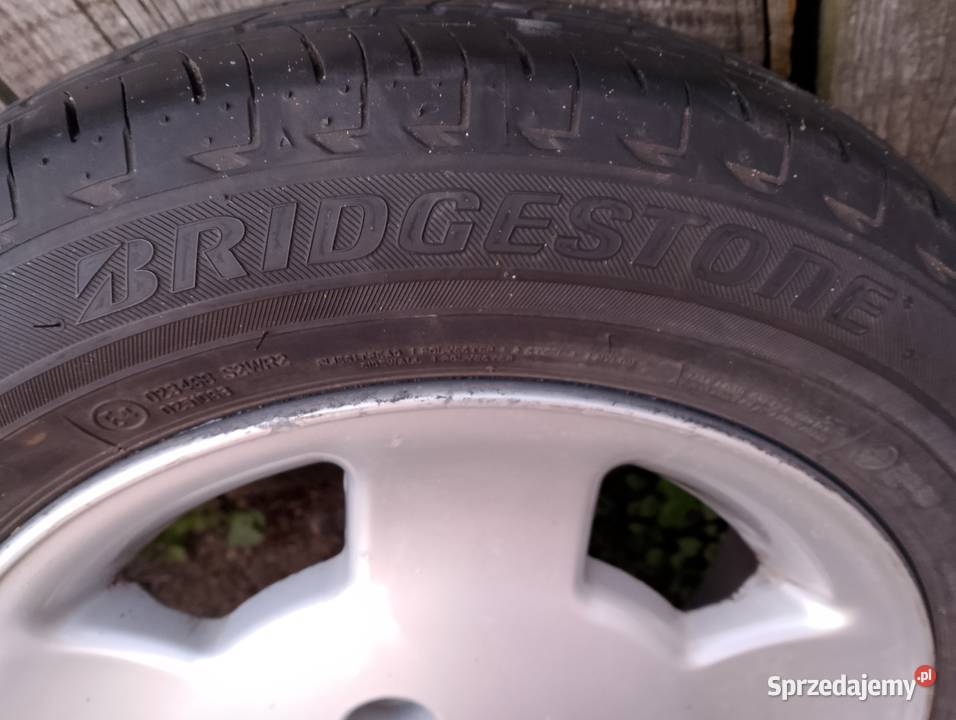 Oryginalne alufelgi Ford z oponami R14 aluminiowe Jędrzejów sprzedam