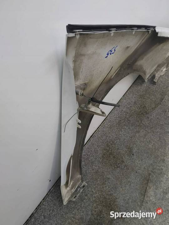 BŁOTNIK LEWY PRZÓD BIAŁY Opel Zafira III 2011