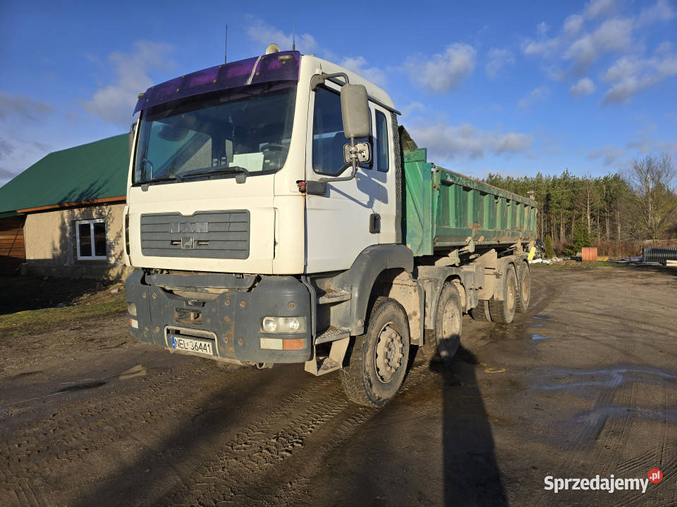 Wywrotka MAN TGA 41360 8x4 hydroburta biały Rogalik