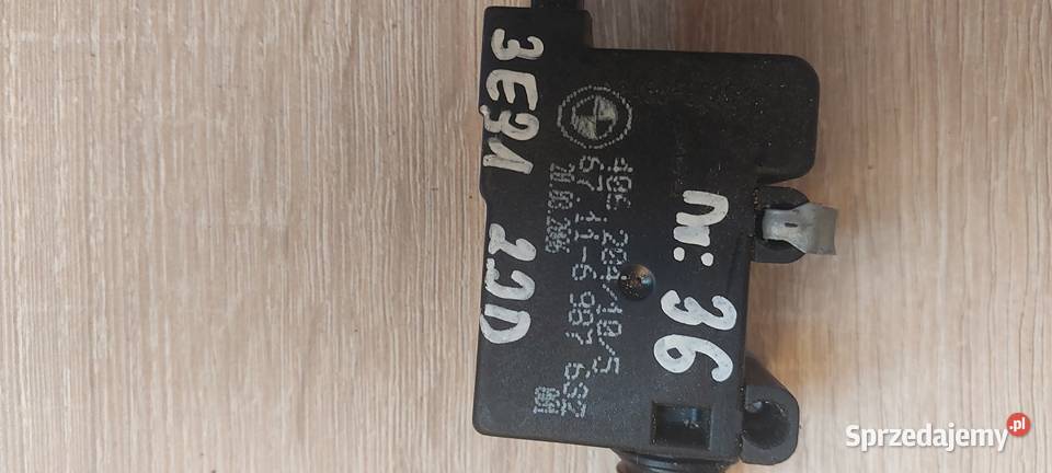 Siłownik klapki wlewu paliwa BMW E91 67116987 osobowe