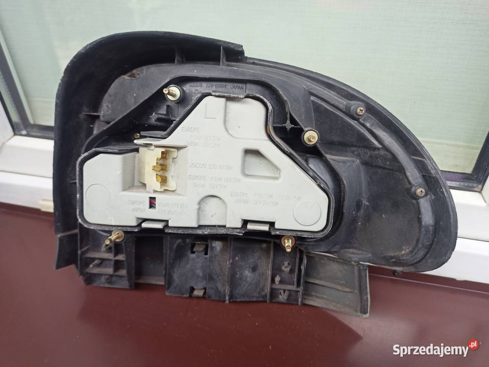 Mazda 121 lampa tył tylna lewa listwa maskująca Sieradz sprzedam