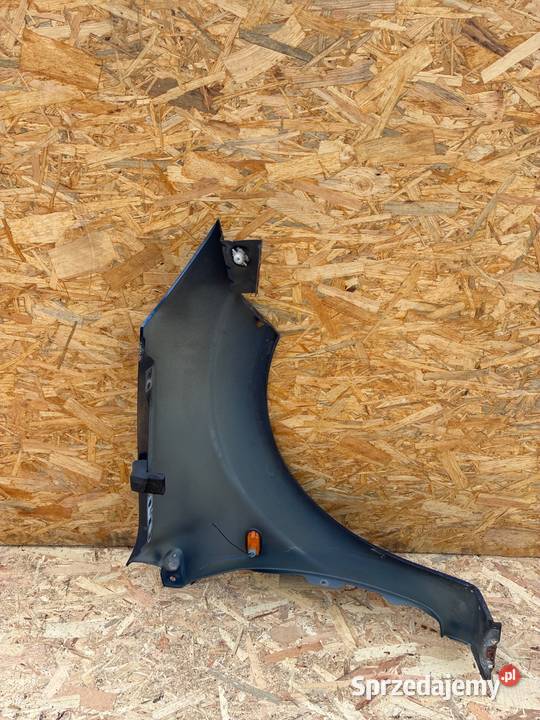 Ford Fiesta Mk6 kod lak c6 BŁOTNIK PRZÓD PRZEDNI Słowikowo