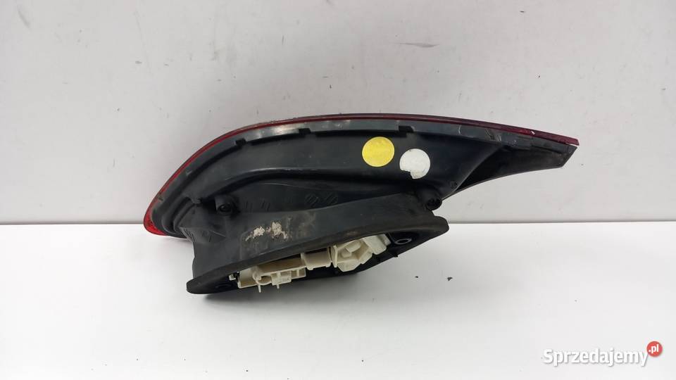 OPEL ASTRA J HB LAMPA TYŁ LEWA W KLAPĘ CIEMNA wielkopolskie Zbierkowo
