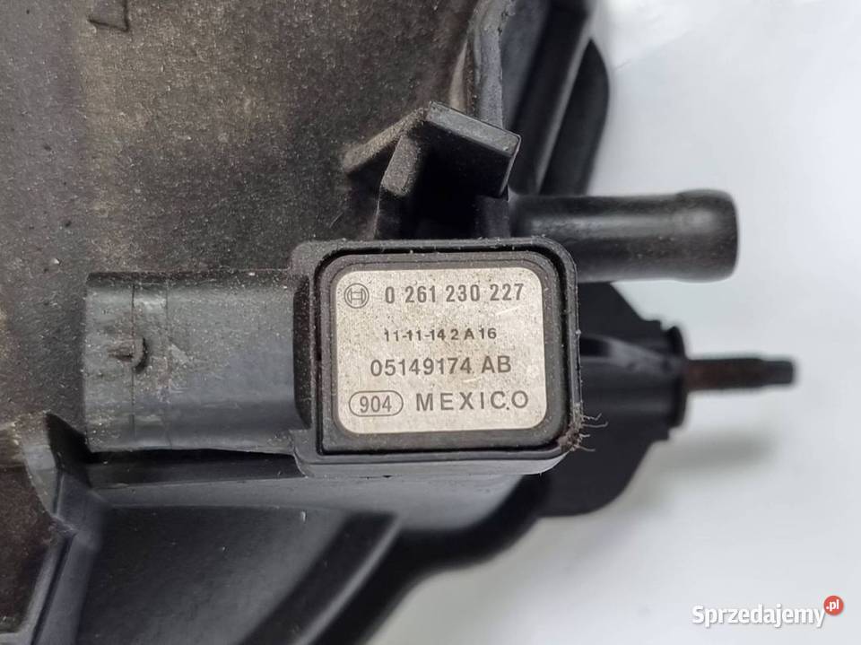 KOLEKTOR SSĄCY DODGE GRAND CARAVAN 05149174AB