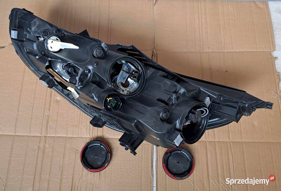 Uszkodzony reflektor lampa 92102 G4060 prawy Lampy przednie