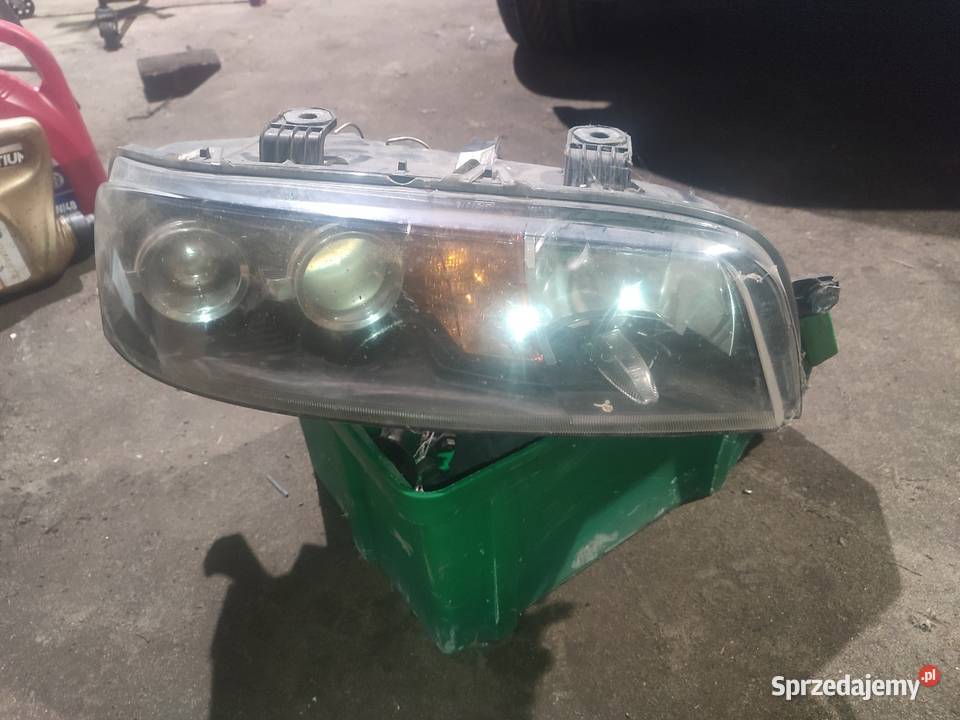 Lampa przód prawa przednia reflektor fiat Punto Lampy przednie Motoryzacja Wrzosówka