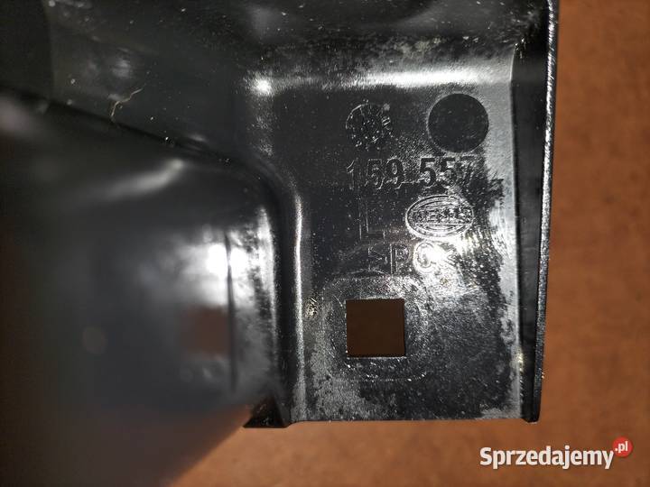 Ślizg lampy lewy przód BMW E65 E66 przedlift Poręba sprzedam