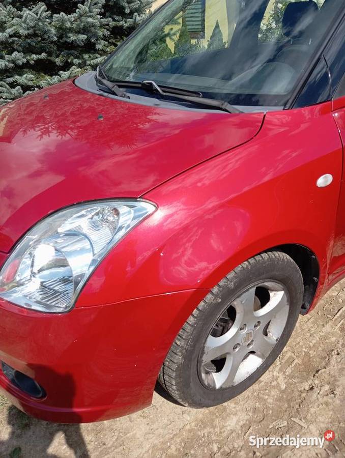 Błotnik Suzuki Swift 20052010 czerwony zdf Sucha Beskidzka