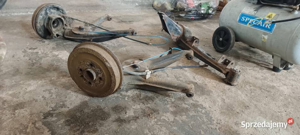 Kompletna tylna belka BMW E30 wahacze bębnowe Piasek