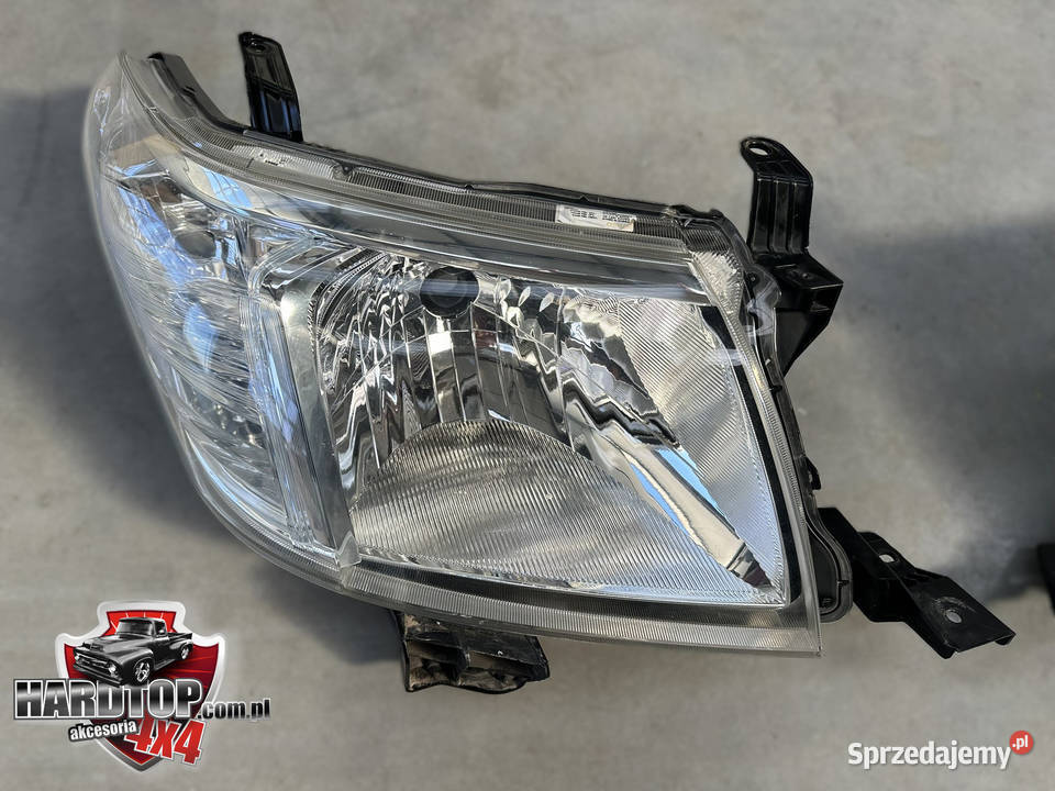 Lampa Oryginalny Reflektor Przedni Toyota Hilux Lampy przednie Pasłęk sprzedam