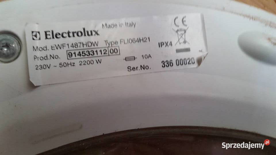 Duże srebrne drzwiczki pralki Electrolux model Warszawa