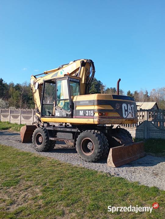 Cat m315 umowa koparka kołowa Pilica