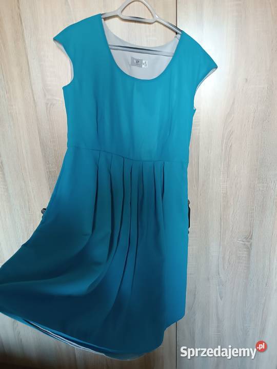 Niebieska sukienka koktajlowa odcięty pas sprzedam