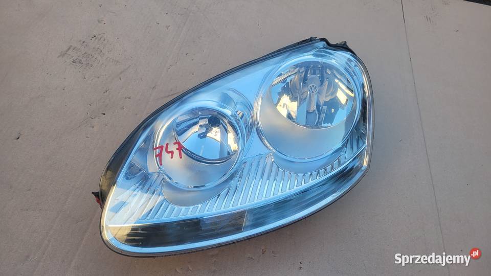 VW GOLF V 5 LEWY REFLEKTOR LAMPA LEWA PRZOD 747 Ruda Śląska