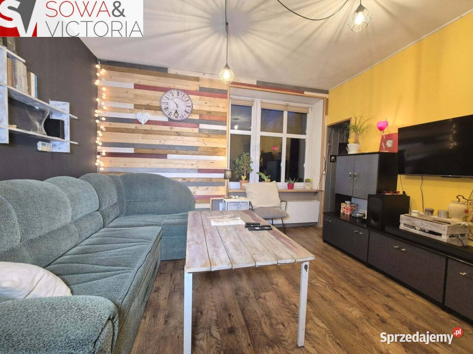 Mieszkanie z garderobą ogródkiem i garażem