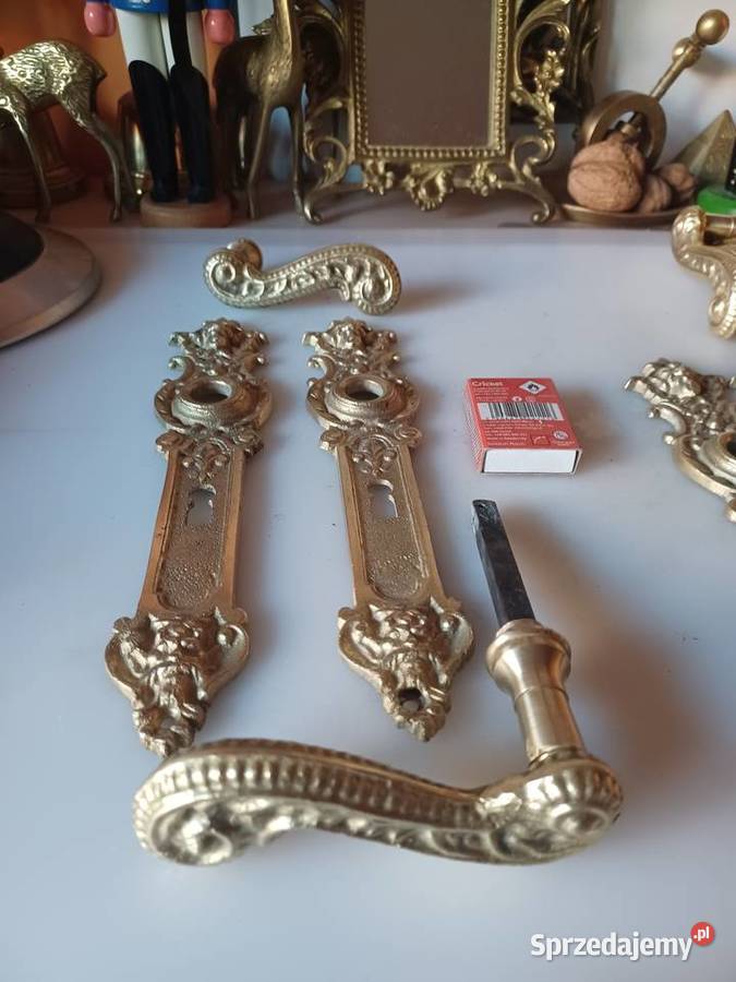 Mosiężne klamki i szyldy pałacowe Poznań
