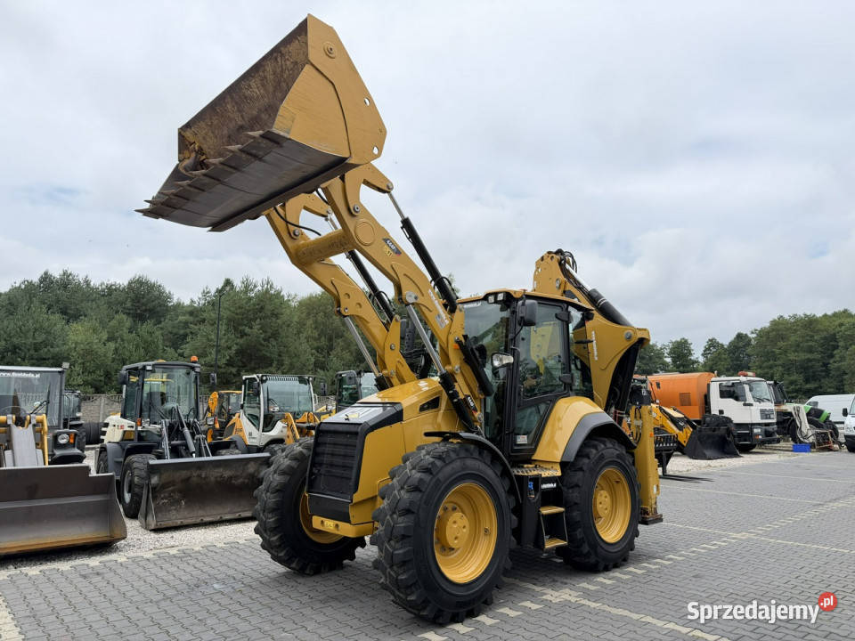 na równych kołach Caterpillar 444F Sterowanie na Koła Koparko ładowarki świętokrzyskie Widełki