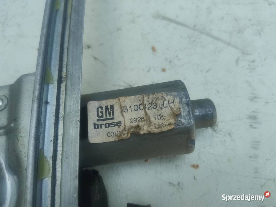 MECHANIZM PODNOŚNIK SZYBY LEWY TYŁ OPEL ASTRA