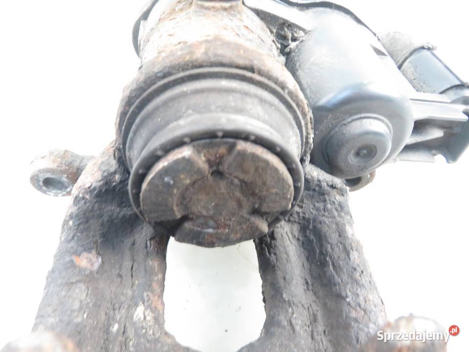 ZACISK LEWY TYŁ BMW 5 F10 520 d