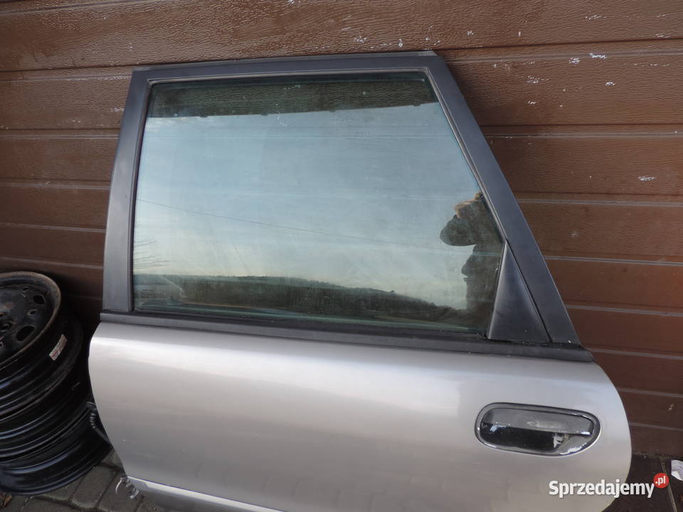 VOLVO V40 I FL DRZWI LEWE TYLNE TYŁ 35722 Nowy Sącz