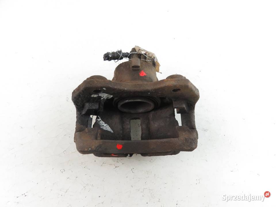 ZACISK LEWY PRZÓD NISSAN PRIMERA P11 20 16V osobowe