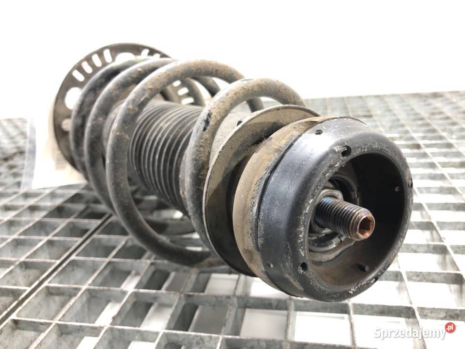 AMORTYZATOR LEWY PRZÓD ZE SPRĘŻYNĄ SKODA RAPID