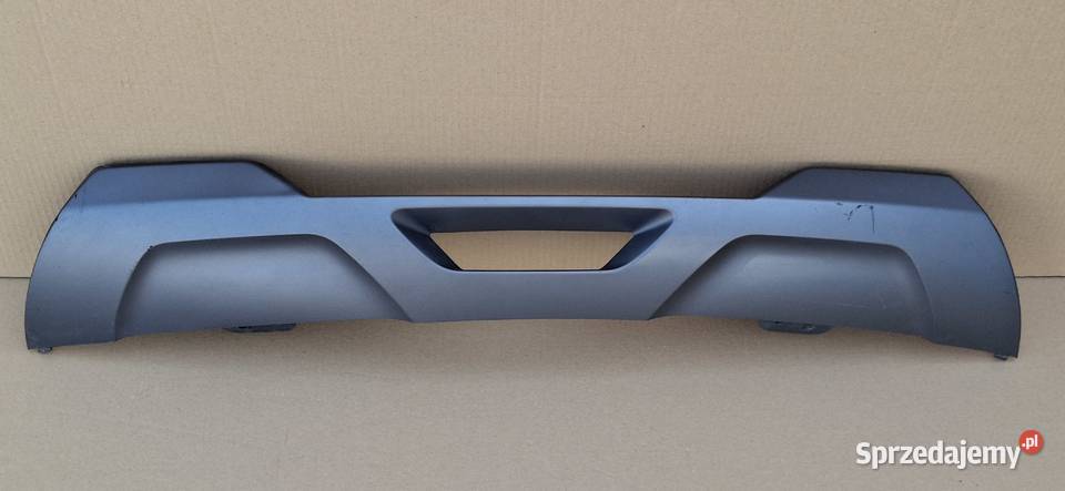 DACIA SPRING DOKŁADKA ZDERZAKA TYŁ DYFUZOR Bieleń