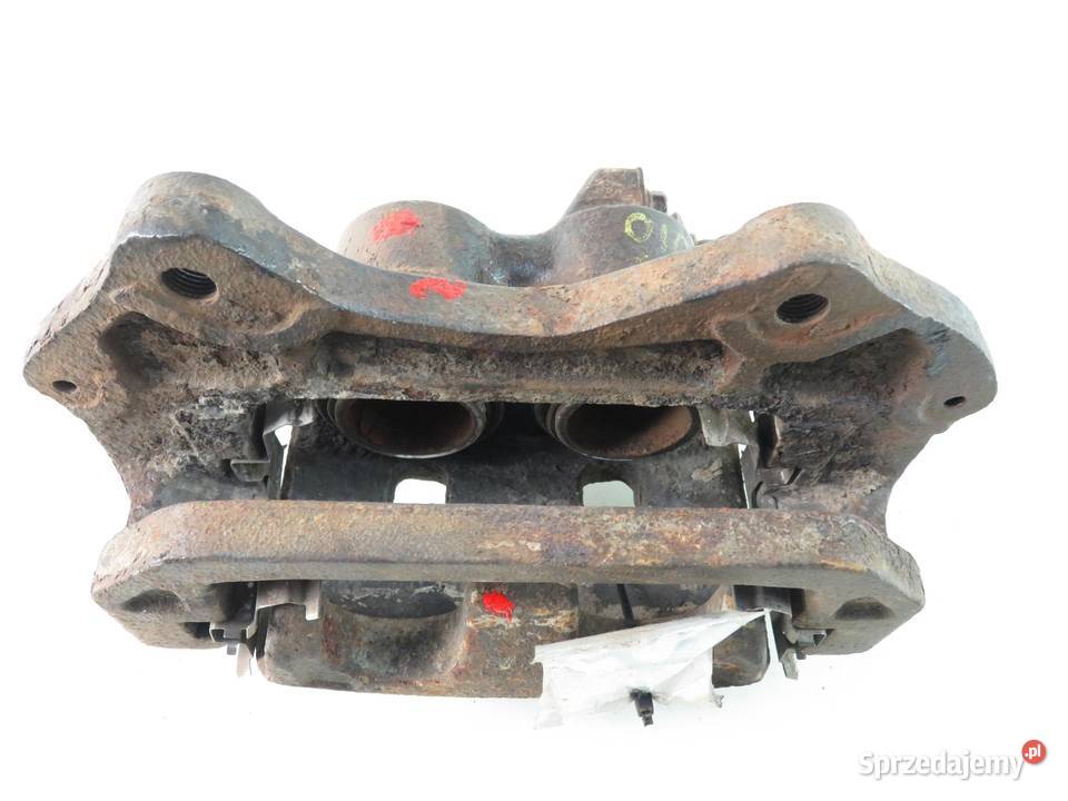 ZACISK LEWY PRZÓD MITSUBISHI L200 II 25 TD osobowe