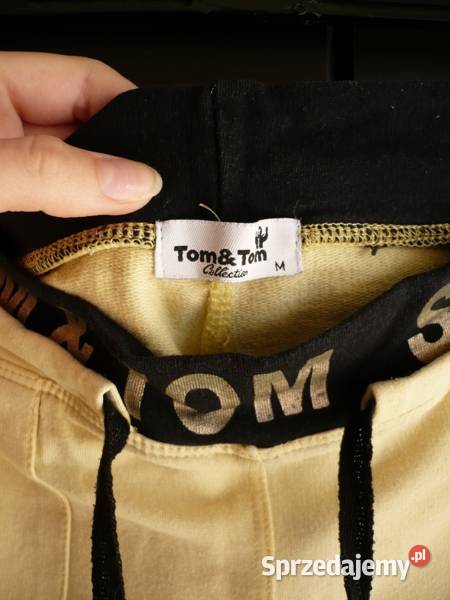 Żółtoczarne spodnie dresowe rybaczki m 38 Toruń