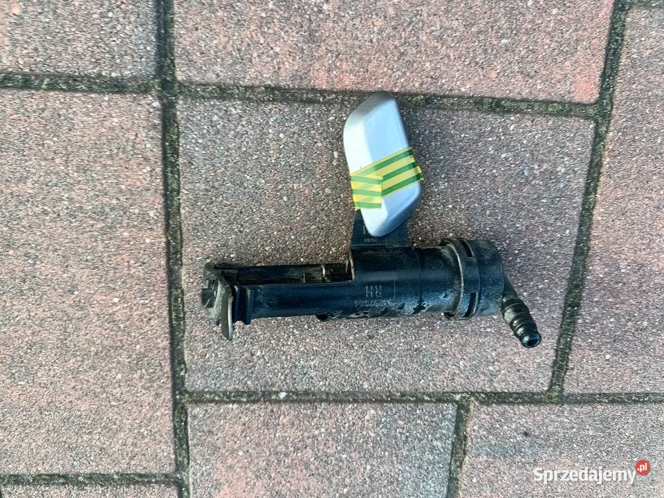 Spryskiwacz prawy reflektora Xenonu Meriva A osobowe Witkowo