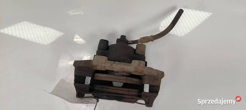 ZACISK HAMULCOWY PRZÓD PRAWY OPEL CORSA B
