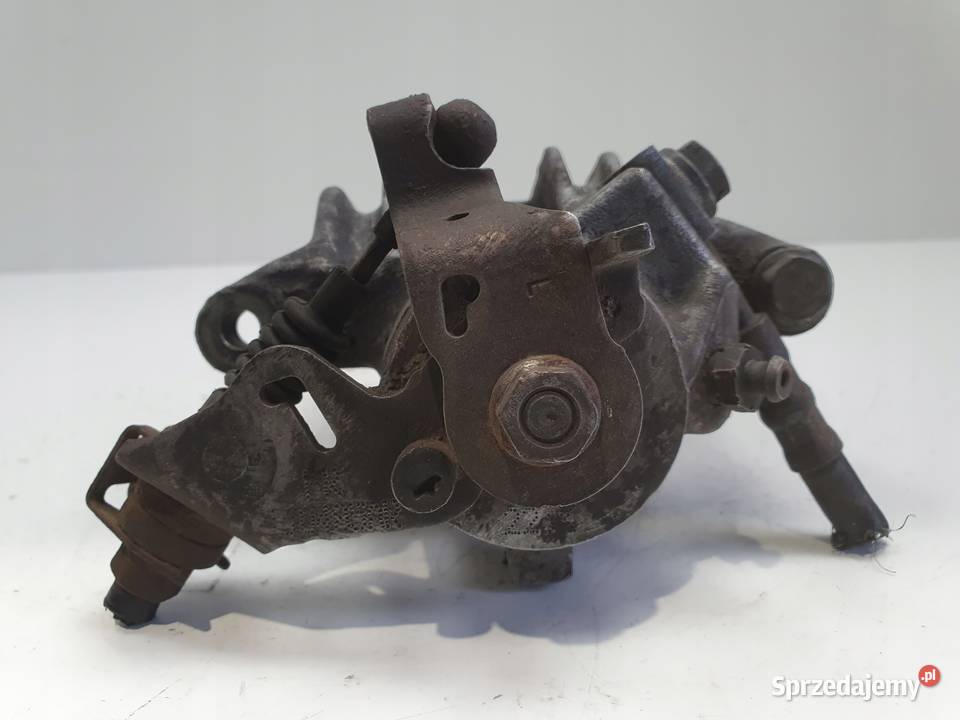 VW Golf IV Bora Audi A3 Toledo II LEWY ZACISK Chełm