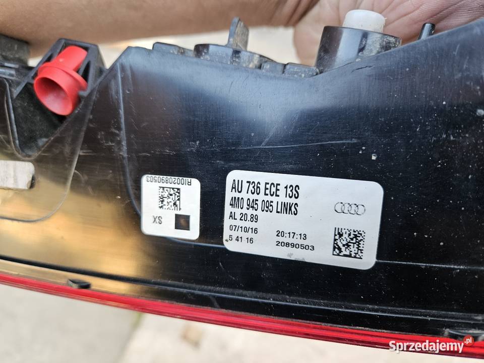 AUDI Q7 4M0 LAMPA W ZDERZAK LEWA TYŁ 4M0945095 Międzychód
