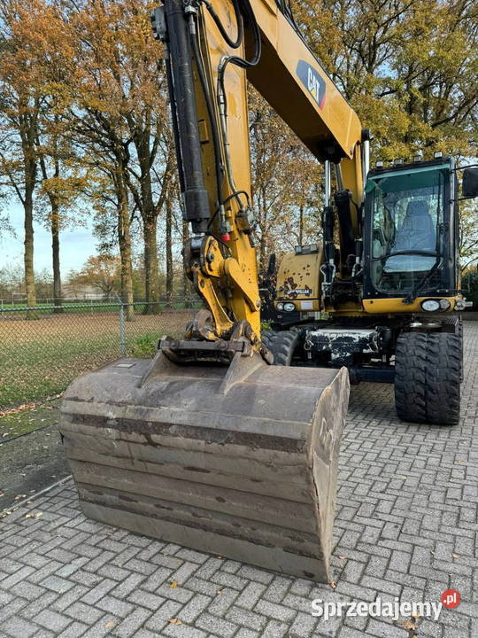 Koparka kolowa Catetpillar M 316 D tez leasing Warszawa sprzedam