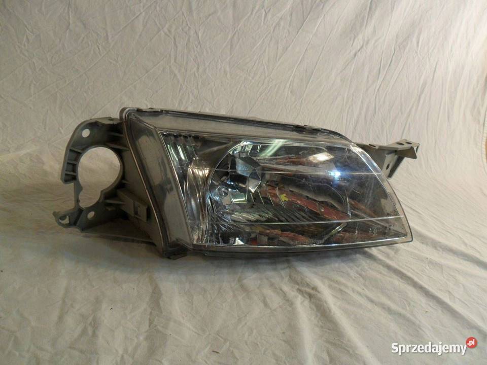 Reflektor Przód strona lewa Mitsubishi Pajero Nowy Tomyśl