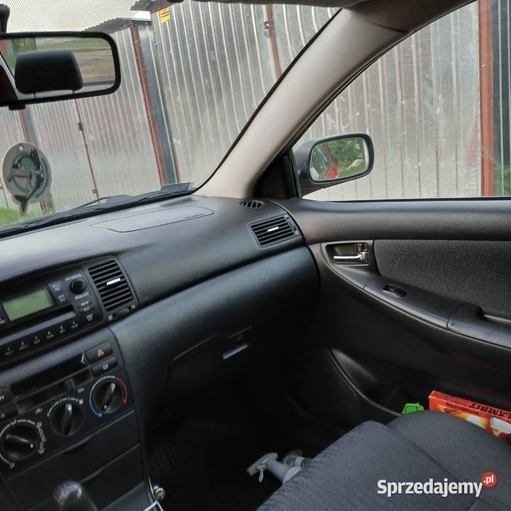 Toyota Corolla Sedan 14 benzyna welurowa tapicerka