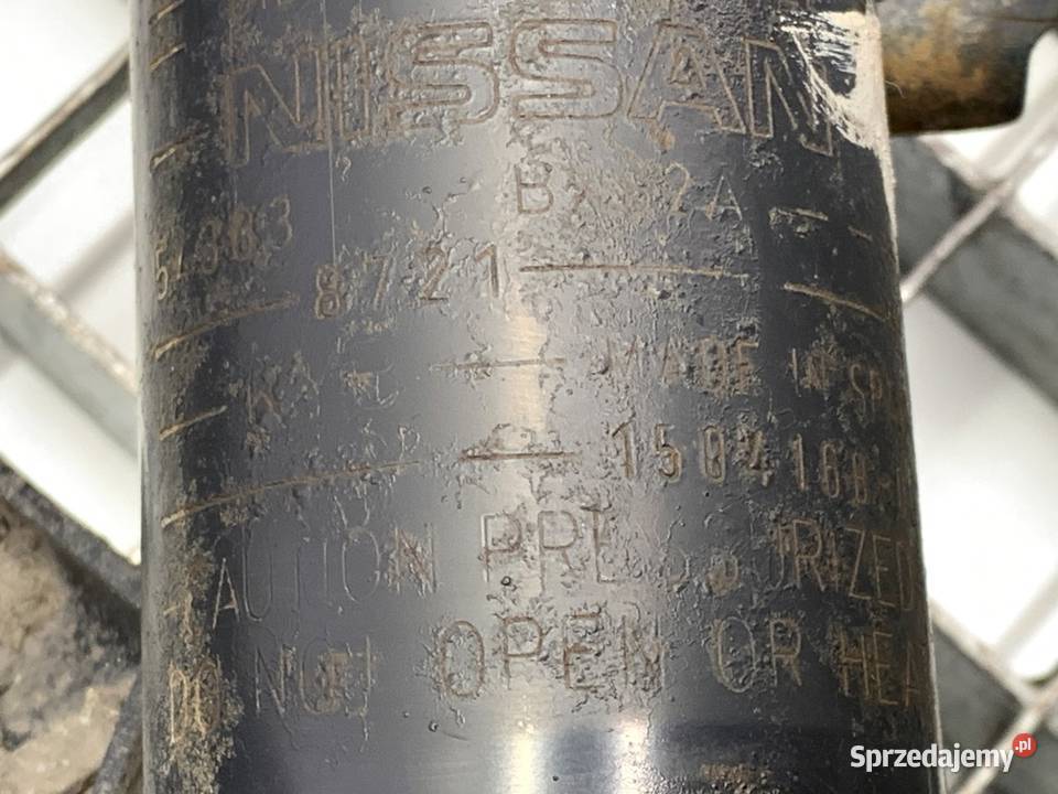 AMORTYZATOR LEWY PRZÓD ZE SPRĘŻYNĄ NISSAN JUKE