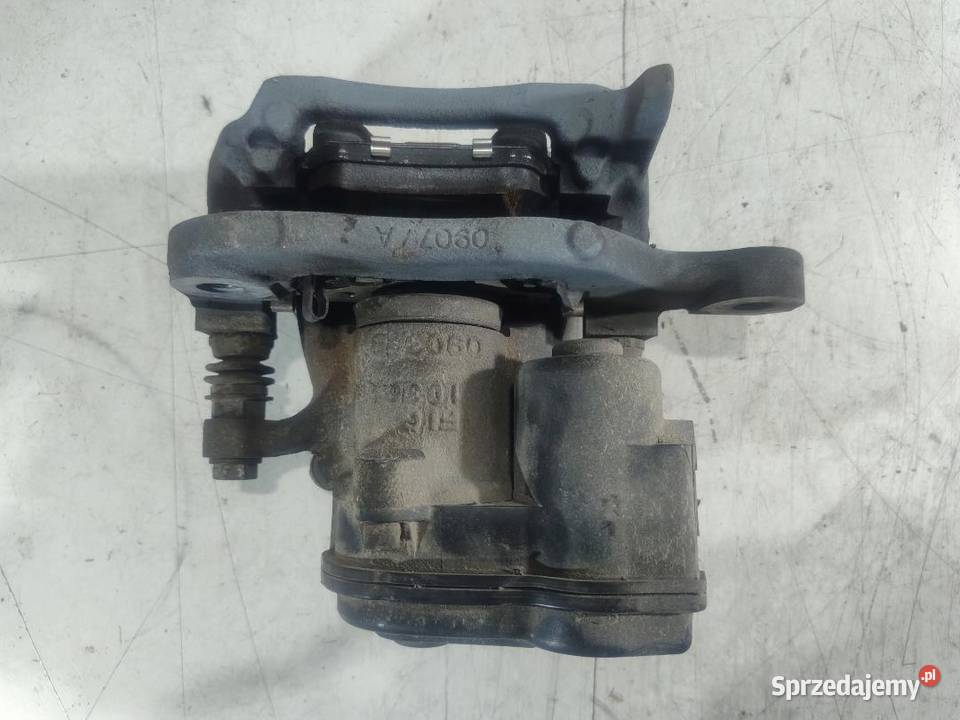 ZACISK HAMULCOWY PRAWY NISSAN QASHQAI J11 osobowe