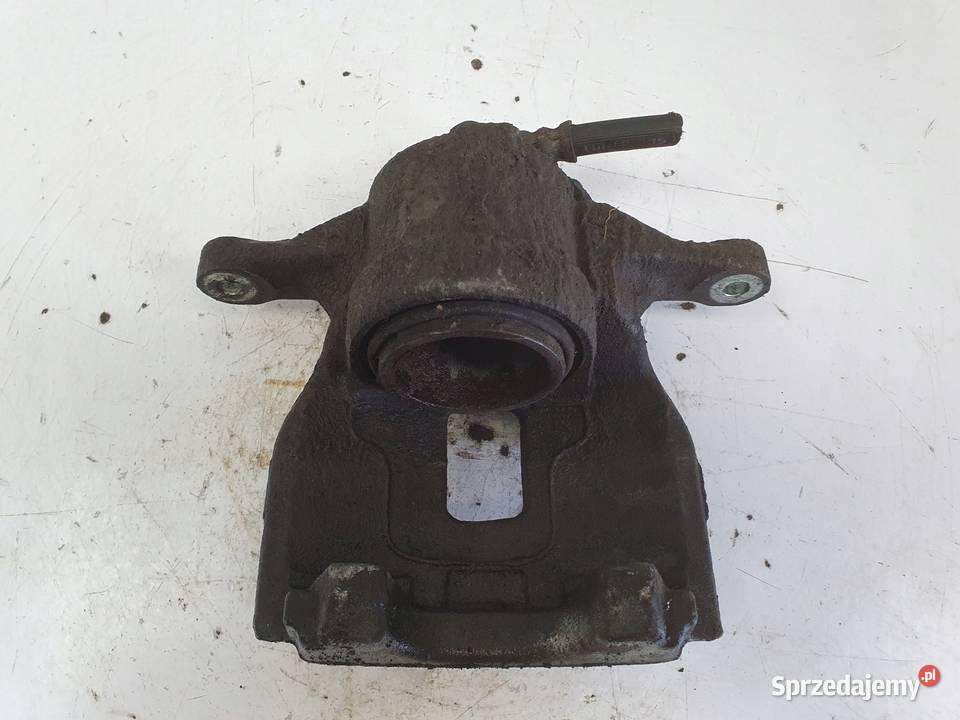 Toyota Corolla XII E21 PRAWY PRZEDNI ZACISK Rudka