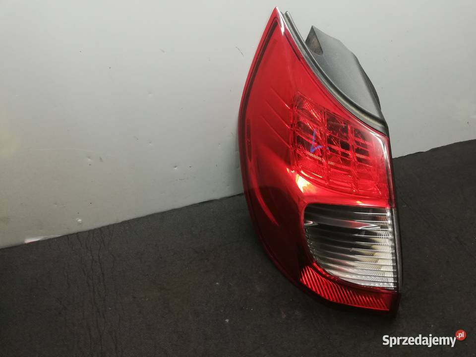 Scenic II lift lampa lewy tył wielkopolskie Swarzędz