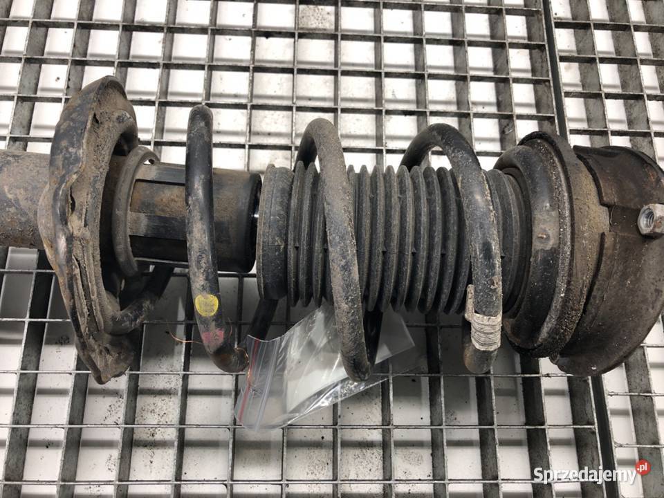 AMORTYZATOR LEWY PRZÓD ZE SPRĘŻYNĄ VW PASSAT B8 osobowe