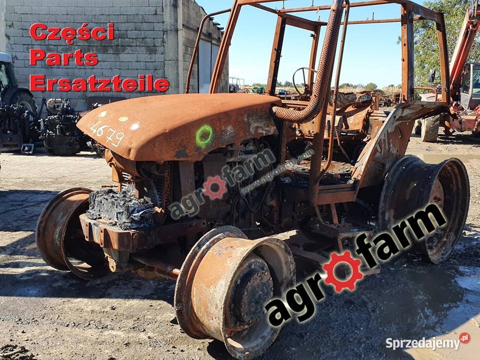 Holland TL100 części silnik skrzynia biegów Byków sprzedam