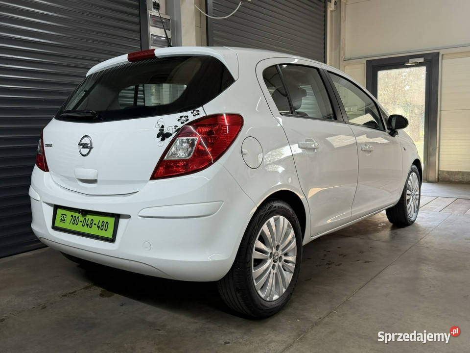 Opel Corsa 90tyśkm Stan perfekt Bezwypadkowa 1WŁ biały Chechło